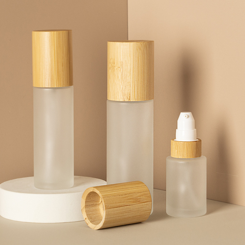 Frosted cosmetische lotionpomp fijne nevel en lotion glazen spuitfles met bamboehouten deksel
