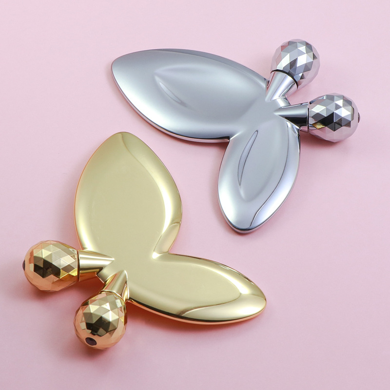 Zinklegering vlindervormige gezichtsmassageroller Zinklegering vlindervormige gezichtsmassageroller