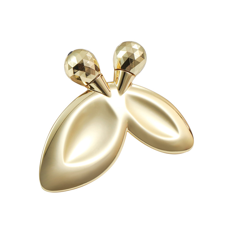 Zinklegering vlindervormige gezichtsmassageroller Zinklegering vlindervormige gezichtsmassageroller