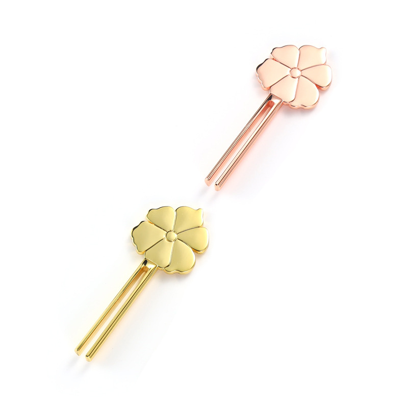 Glimlachende bloemvormige buisknijper van zinklegering Glimlachende bloemvormige buisknijper van zinklegering